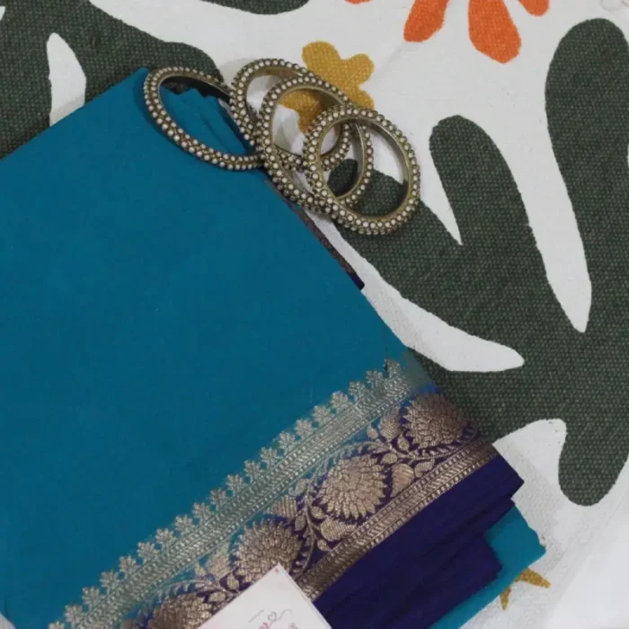 BLUE SAREE PURPLE BORDERED ZARI